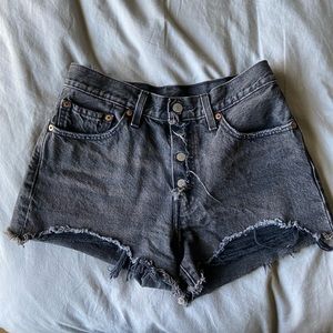Distressed black high waisted Levi shorts